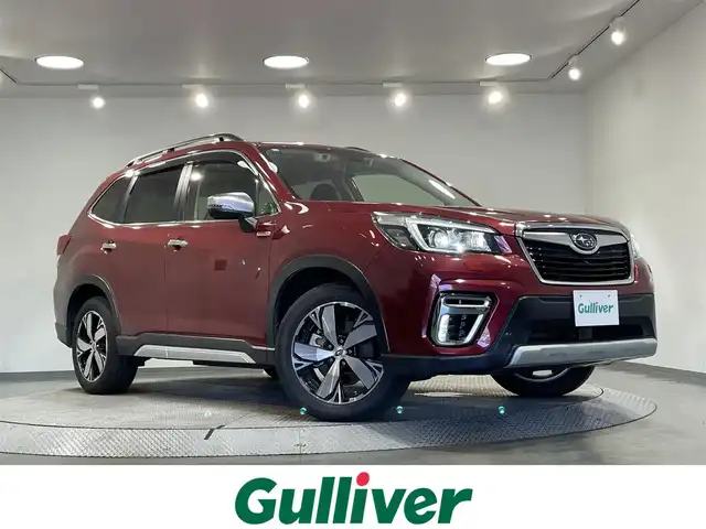 スバル フォレスター ハイブリッド アドバンス 愛知県 2020(令2)年 5.1万km クリムゾンレッドP 純正19インチアルミ・タイヤ有/純正カロッツェリアナビ/（CD・DVD再生/SD/FM/AM/Bluetooth/USB/AUX)/アイサイト　/レーダークルーズコントロール　/シートヒーター　/ビルトインＥＴＣ　/バックカメラ　/デジタルインナーミラー　/ステアリングヒーター　/ドライブレコーダー　/ルーフレール　/メモリー機能付パワーシート　/オートブレーキホールド機能/レーンキープアシスト/ブラインドスポットモニター/パドルシフト/ＬＥＤヘッドライト/LEDフォグランプ/USB接続/純正フロアマット/純正アルミホイール/社外アルミホイール積込/プッシュスタート/　　-スマートキー