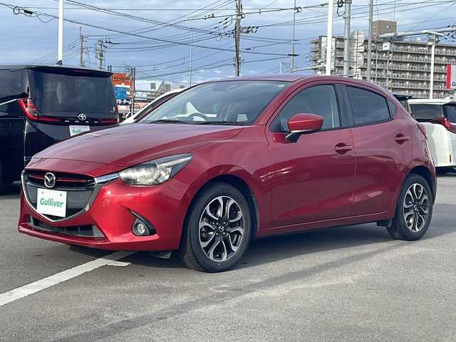マツダ デミオ XD ツーリング 徳島県 2015(平27)年 5.5万km ソウルレッドプレミアムメタリック 純正ナビ/（ラジオ/DISC/USB/フルセグ/AUX/BT）/ワンオーナー/ETC/LEDヘッドライト/パドルシフト/ブラインドスポットモニター/クルーズコントロール/ターボ/オートライト/純正フロアマット/純正16インチアルミホイール/プッシュスタート/アイドリングストップ