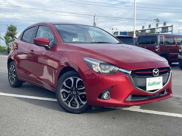 マツダ デミオ XD ツーリング 徳島県 2015(平27)年 5.5万km ソウルレッドプレミアムメタリック 純正ナビ/（ラジオ/DISC/USB/フルセグ/AUX/BT）/ワンオーナー/ETC/LEDヘッドライト/パドルシフト/ブラインドスポットモニター/クルーズコントロール/ターボ/オートライト/純正フロアマット/純正16インチアルミホイール/プッシュスタート/アイドリングストップ