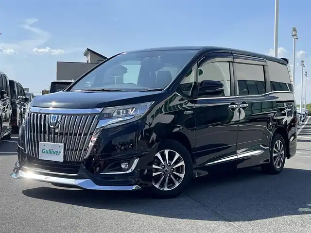 トヨタ エスクァイア ハイブリッド Gi プレミアムパッケージ 奈良県 2017(平29)年 6.8万km ブラック モデリスタエアロ/ALPINE11インチナビ（EX11Z）/（フルセグ/BT/CD/DVD)/ALPINE11インチフリップダウンモニター/クルーズコントロール/バックカメラ/プリクラッシュセーフティ/レーンキープアシスト/両側パワースライドドア/ハーフレザーシート/前席シートヒーター/ステアリングヒーター/後席サンシェード/前後ドライブレコーダー/ETC/純正15インチAW/保証書/取り扱い説明書