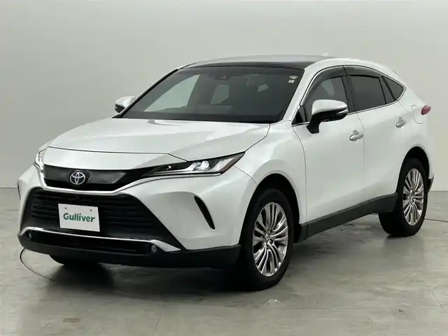 トヨタ ハリアー ハイブリッド Z レザーパッケージ 福岡県 2023(令5)年 1.6万km プラチナホワイトパールマイカ 調光パノラマルーフ　/純正１２．３型ＤＡナビ／フルセグTV　/全方位カメラ　/ＪＢＬプレミアムサウンド　/デジタルルームミラー　/ビルトインETC２．０　/前後ドライブレコーダー　/トヨタセーフティセンス　/レーダークルーズコントロール　/コーナーセンサー　/衝突軽減ブレーキ　/レーンキープ　/ブラインドスポットモニター　/アクセル踏み間違い防止　/ＭＴモード付ＡＴ　/ＨＵＤ　/シートメモリー付きパワーシート　/シートヒーター／ベンチレーション　/ステアリングヒーター　/ＬＥＤヘッドライト