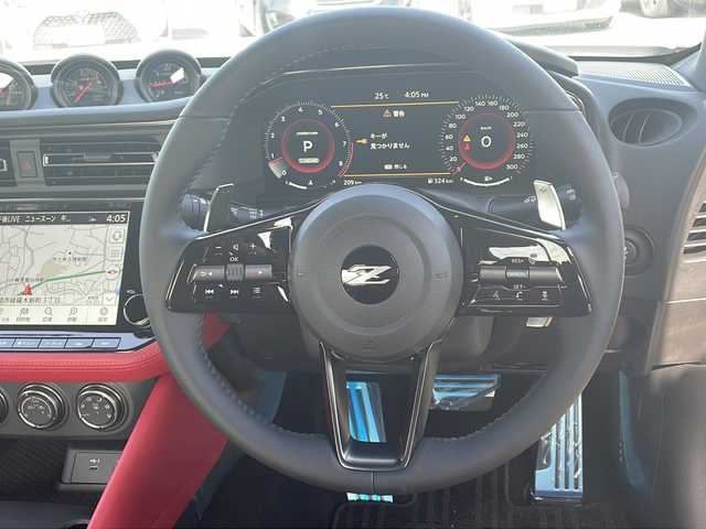 日産 フェアレディ Ｚ バージョンST 山口県 2025(令7)年 0.1万km ブリリアントホワイトパール/スーパーブラック 2トーン ワンオーナー/インテリジェント　クルーズコントロール/インテリジェント　エマージェンシーブレーキ/インテリジェントFCW（前方衝突予測警報）/BSW（後側方車両検知警報）/LDW（車線逸脱警報）/RCTA（後退時車両検知警報）/ふらつき警報/踏み間違い防止装置アシスト/シートヒーター/パワーシート/純正ナビ/バックカメラ/ハイビームアシスト/ハーフレザーシート/コーナーセンサー/パドルシフト/ETC2.0/BOSEスピーカー/純正１９インチアルミホイールタイヤ