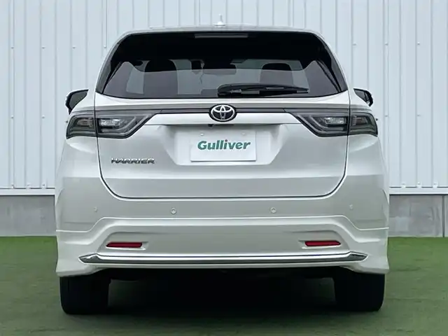 トヨタ ハリアー プレミアム 香川県 2014(平26)年 4.6万km ホワイトパールクリスタルシャイン 社外9インチメモリーナビ/→AM/FM/CD/DVD/Bluetooth/フルセグTV/バックカメラ/モデリスタフルエアロ/パノラマルーフ/ウッドコンビステアリング/レーダークルーズコントロール/パワーバックドア/パワーシート/衝突軽減ブレーキ/ドライブレコーダー/レーンキープアシスト/純正18インチアルミホイール/純正フロアマット/ステアリングスイッチ/オートハイビーム/LEDヘッドライト/プッシュスタート/スマートキー/ハーフレザーシート