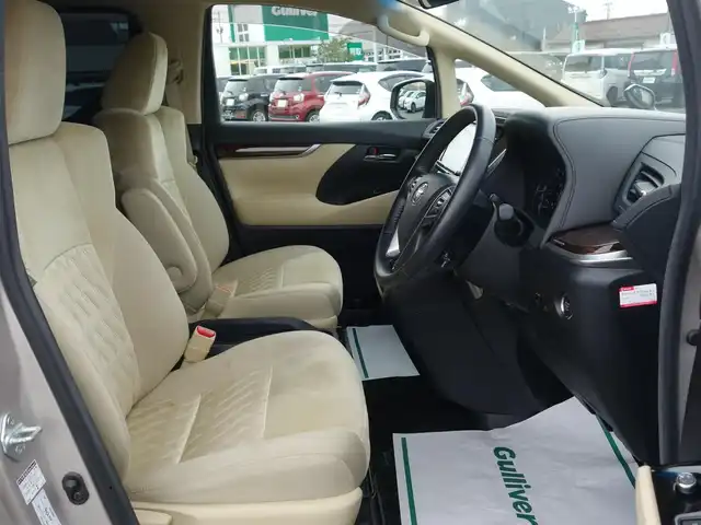 トヨタ アルファード X 山形県 2018(平30)年 9万km スティールブロンドM 純正フリップダウンモニター (V12T-R66C)/純正SDナビ/　　【CD DVD BT フルセグ MSV】/バックカメラ/両側パワースライドドア/レーダークルーズコントロール/LEDオートヘッドライト/純正16インチアルミホイール/コーナーセンサー/ステアリングスイッチ/MTモード付AT/電動格納ウィンカーミラー/フォグランプ/スマートキー×2/ETC