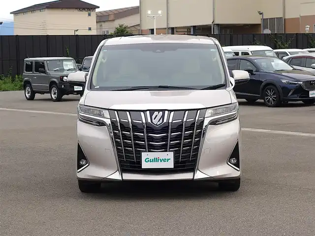 トヨタ アルファード X 山形県 2018(平30)年 9万km スティールブロンドM 純正フリップダウンモニター (V12T-R66C)/純正SDナビ/　　【CD DVD BT フルセグ MSV】/バックカメラ/両側パワースライドドア/レーダークルーズコントロール/LEDオートヘッドライト/純正16インチアルミホイール/コーナーセンサー/ステアリングスイッチ/MTモード付AT/電動格納ウィンカーミラー/フォグランプ/スマートキー×2/ETC