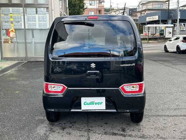 スズキ ワゴンＲ FX 宮城県 2024(令6)年 1.3万km ブルーイッシュブラックパール3 ワンオーナー/4WD/社外SDナビ/DVD/CD/BT/USB/フルセグTV/前席シートヒーター/コーナーセンサー/ETC/オートライト/衝突軽減システム/レーンキープアシスト/横滑り防止装置/エンジンプッシュスタート/スマートキー/スペアキー/保証書/取扱説明書/スチールホイール付き夏タイヤ/（155/65/R14）