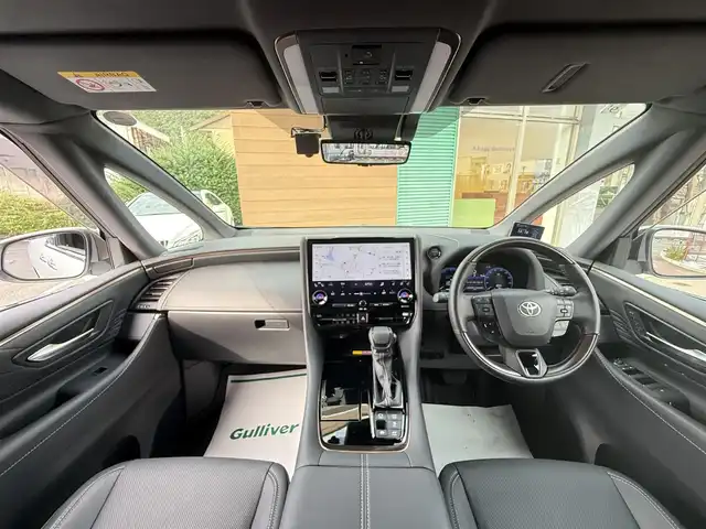 トヨタ アルファードハイブリット Z 香川県 2023(令5)年 2.8万km プラチナホワイトパールマイカ 純正メモリナビ/(フルセグ/Bluetooth/USB)/トヨタセーフティセンス/・アラウンドビューモニター/・レーダークルーズコントロール/・オートマチックハイビーム/・プリクラッシュセーフティ/・レートレーシングアシスト/・VSC/・BSM/左右独立ムーンルーフ/両側パワースライドドア/黒革シート/前席パワーシート/前席シートヒーター/オットマン/電動格納サードシート/電動リアゲート/置くだけ充電/LEDヘッドライト/前後コーナーセンサー/純正18インチアルミ