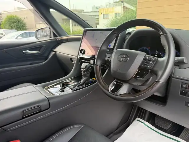 トヨタ アルファードハイブリット Z 香川県 2023(令5)年 2.8万km プラチナホワイトパールマイカ 純正メモリナビ/(フルセグ/Bluetooth/USB)/トヨタセーフティセンス/・アラウンドビューモニター/・レーダークルーズコントロール/・オートマチックハイビーム/・プリクラッシュセーフティ/・レートレーシングアシスト/・VSC/・BSM/左右独立ムーンルーフ/両側パワースライドドア/黒革シート/前席パワーシート/前席シートヒーター/オットマン/電動格納サードシート/電動リアゲート/置くだけ充電/LEDヘッドライト/前後コーナーセンサー/純正18インチアルミ