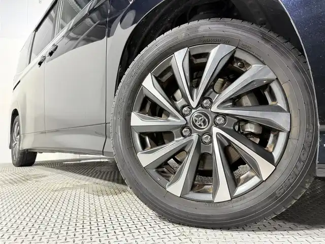 トヨタ ヴォクシー ハイブリッド S－Z 大阪府 2024(令6)年 2.5万km アティチュードブラックマイカ 快適利便パッケージ 純正10.5incナビTV バックカメラ フリップダウンモニター ハーフレザー シート＆ハンドルヒーター オットマン 電動リアゲート レーダーC 衝突軽減ブレーキ レーンアシスト 前後ドライブレコーダー