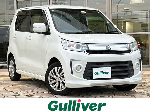 スズキ ワゴンＲ スティングレー X 石川県 2014(平26)年 6.5万km クリスタルホワイトP 純正SDナビ/・Bluetooth/・AM/・FM/・ワンセグTV/・USB/・HDMI/・iPod/・video/プリクラッシュ/・バックカメラ/・フロントグリルイルミネーション/・LEDヘッドライト/・フォグランプ/・オートライト/・純正アルミホイール/・純正フロアマット/・ステアリングリモコン/・シートヒーター/・スマートキー/・プッシュスタート/・ETC/・ドアバイザー