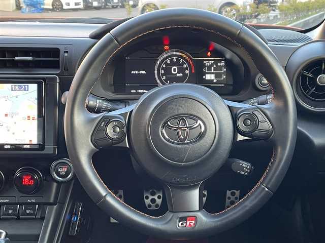 トヨタ ＧＲ８６ RZ 10thアニバーサリーLTD 道央・札幌 2023(令5)年 1.8万km フレイムオレンジ 登録時走行距離 17832km/ワンオーナー/6MT/純正ディーラーOP9インチナビ/(AM/FM/CD/DVD/BT)/フルセグTV/バックカメラ/クルーズコントロール/前席シートヒーター/ステアリングスイッチ/Wedssport18インチアルミホイール/HKSマフラー装着/純正マフラー積み込みあり/ホワイトホイール装着冬タイヤあり/(グッドイヤー2023年製・215/45R17)/LEDヘッドライト/電動格納ミラー/革巻きステアリング/プッシュスタート/室内灯LED/ドアバイザー/ロックナットあり/取説/保証書