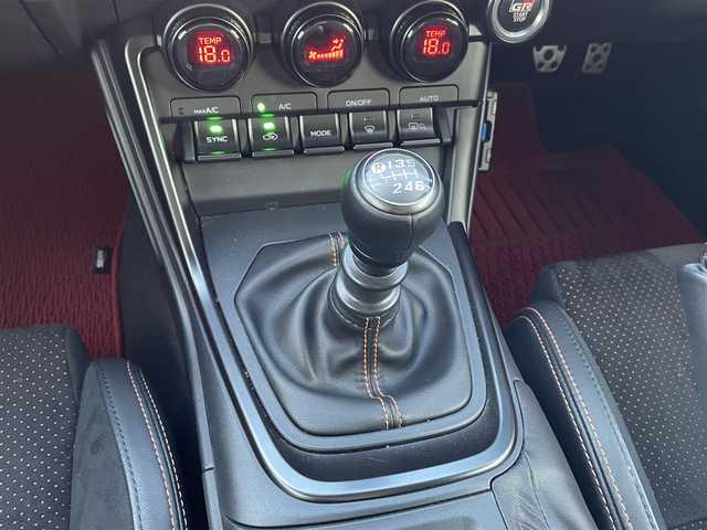 トヨタ ＧＲ８６ RZ 10thアニバーサリーLTD 道央・札幌 2023(令5)年 1.8万km フレイムオレンジ 登録時走行距離 17832km/ワンオーナー/6MT/純正ディーラーOP9インチナビ/(AM/FM/CD/DVD/BT)/フルセグTV/バックカメラ/クルーズコントロール/前席シートヒーター/ステアリングスイッチ/Wedssport18インチアルミホイール/HKSマフラー装着/純正マフラー積み込みあり/ホワイトホイール装着冬タイヤあり/(グッドイヤー2023年製・215/45R17)/LEDヘッドライト/電動格納ミラー/革巻きステアリング/プッシュスタート/室内灯LED/ドアバイザー/ロックナットあり/取説/保証書