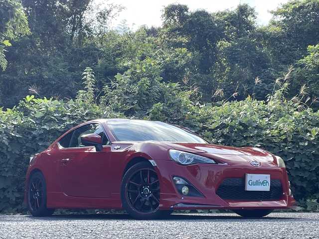トヨタ ８６ GT 大分県 2014(平26)年 10.1万km ライトニングレッド モデリスタエアロ/WORK17インチアルミホイール/ガナドールマフラー/車高調（レンチなし）/純正ナビ/地デジ/Bluetooth/純正HIDヘッドライト/オートライトコントロール/スマートキー/エンジンプッシュスタート/ETC