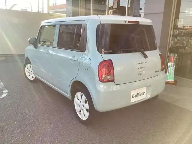 スズキ ラパン X 愛知県 2013(平25)年 7万km アロマティックアクアメタリック/スペリアホワイト ユーザー買取　/スマートキー　/アイドリングストップ　/電動格納ミラー　/社外SDDナビ　/ワンセグ　/ヘッドライトレベライザー　/純正アルミ　/フロアマット　/ツートンカラー　/シートリフター　/ＩＳＯＦＩＸ　/ＤＶＤ視聴