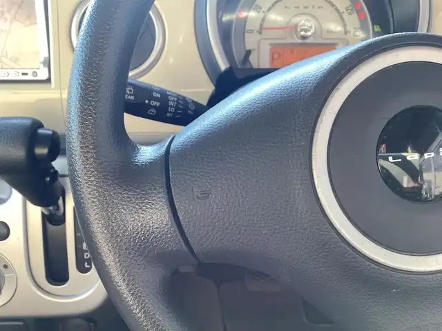 スズキ ラパン X 愛知県 2013(平25)年 7万km アロマティックアクアメタリック/スペリアホワイト ユーザー買取　/スマートキー　/アイドリングストップ　/電動格納ミラー　/社外SDDナビ　/ワンセグ　/ヘッドライトレベライザー　/純正アルミ　/フロアマット　/ツートンカラー　/シートリフター　/ＩＳＯＦＩＸ　/ＤＶＤ視聴