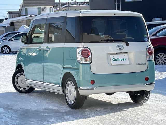 ダイハツ ムーヴ キャンバス G メイクアップ リミテッド　SAⅢ 道北・旭川 2019(令1)年 0.9万km パールホワイトⅢ/ファインミントメタリック 2トーン /4WD//禁煙車//純正ナビ/CD/DVD/BT/フルセグ/SD/HDMI//パノラミックビューモニター//両側パワースライドドア//アイドリングストップ//オートライト//スマートアシスト3/衝突軽減ブレーキ/誤発進抑制機能/対自転車・歩行者警報ブレーキ/オートハイビーム/前方発進お知らせ機能//ETC//ナビ連動ドライブレコーダー//横滑り防止//LEDヘッドライト//ステアリングスイッチ//純正フロアマット//ドアバイザー//保証書//スペアキー