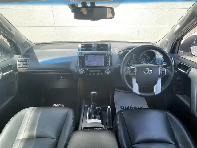 トヨタ ランドクルーザー プラド TX Lパッケージ 茨城県 2015(平27)年 9.3万km ホワイトパールクリスタルシャイン 中期型モデル/革巻きステアリング/純正メーカーナビ/フロントカメラ/サイドカメラ/バックカメラ/サンルーフ/ブラウンレザーシート/シートヒーター/電動格納サードシート/モデリスタ製エアロ/LEDヘッドライト/ビルドインETC/パワーシート/プッシュスタート