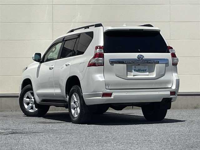 トヨタ ランドクルーザー プラド TX Lパッケージ 茨城県 2015(平27)年 9.3万km ホワイトパールクリスタルシャイン 中期型モデル/革巻きステアリング/純正メーカーナビ/フロントカメラ/サイドカメラ/バックカメラ/サンルーフ/ブラウンレザーシート/シートヒーター/電動格納サードシート/モデリスタ製エアロ/LEDヘッドライト/ビルドインETC/パワーシート/プッシュスタート