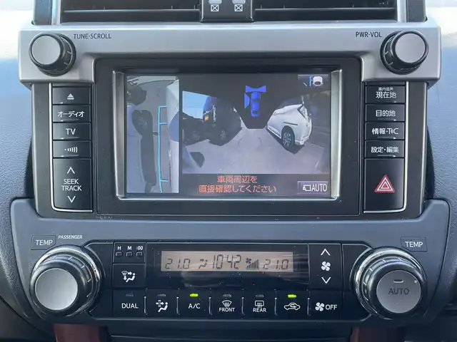 トヨタ ランドクルーザー プラド TX Lパッケージ 茨城県 2015(平27)年 9.3万km ホワイトパールクリスタルシャイン 中期型モデル/革巻きステアリング/純正メーカーナビ/フロントカメラ/サイドカメラ/バックカメラ/サンルーフ/ブラウンレザーシート/シートヒーター/電動格納サードシート/モデリスタ製エアロ/LEDヘッドライト/ビルドインETC/パワーシート/プッシュスタート
