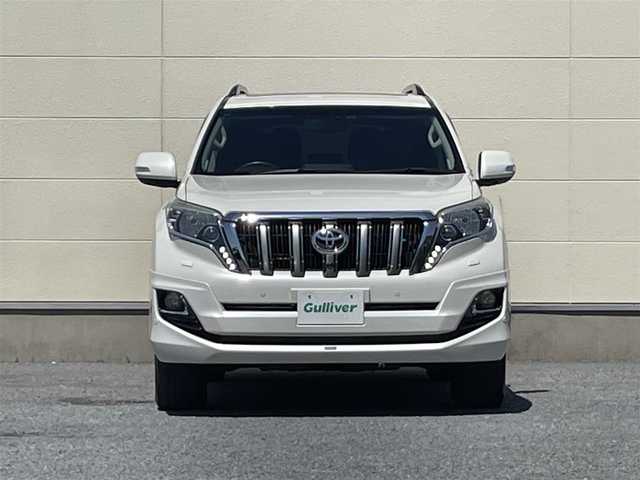 トヨタ ランドクルーザー プラド TX Lパッケージ 茨城県 2015(平27)年 9.3万km ホワイトパールクリスタルシャイン 中期型モデル/革巻きステアリング/純正メーカーナビ/フロントカメラ/サイドカメラ/バックカメラ/サンルーフ/ブラウンレザーシート/シートヒーター/電動格納サードシート/モデリスタ製エアロ/LEDヘッドライト/ビルドインETC/パワーシート/プッシュスタート