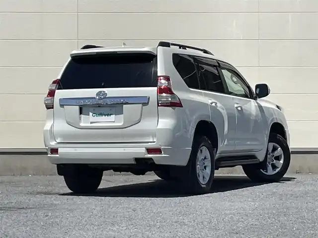 トヨタ ランドクルーザー プラド TX Lパッケージ 茨城県 2015(平27)年 9.3万km ホワイトパールクリスタルシャイン 中期型モデル/革巻きステアリング/純正メーカーナビ/フロントカメラ/サイドカメラ/バックカメラ/サンルーフ/ブラウンレザーシート/シートヒーター/電動格納サードシート/モデリスタ製エアロ/LEDヘッドライト/ビルドインETC/パワーシート/プッシュスタート