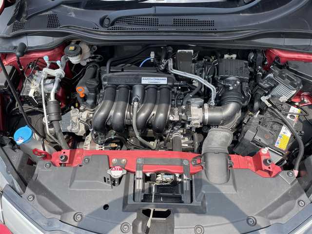 ホンダ ヴェゼル X ホンダセンシング 滋賀県 2018(平30)年 4.9万km プレミアムクリスタルレッドM 純正SDナビ/【フルセグTV、CD・DVD、Bluetooth】/バックカメラ/衝突被害軽減システム/車線逸脱警報/追従式クルーズコントロール/ハーフレザーシート/横滑り防止装置/ビルトインETC/ドライブレコーダー/アイドリングストップ/LEDヘッドライト/オートライト/フォグランプ/純正16インチAW/シートヒーター/電動パーキングブレーキ/プッシュスタート/スマートキー/純正フロアマット/スペアキー