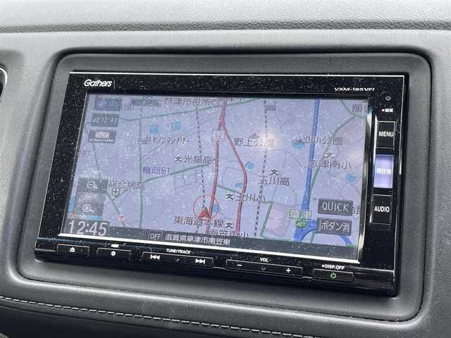 ホンダ ヴェゼル X ホンダセンシング 滋賀県 2018(平30)年 4.9万km プレミアムクリスタルレッドM 純正SDナビ/【フルセグTV、CD・DVD、Bluetooth】/バックカメラ/衝突被害軽減システム/車線逸脱警報/追従式クルーズコントロール/ハーフレザーシート/横滑り防止装置/ビルトインETC/ドライブレコーダー/アイドリングストップ/LEDヘッドライト/オートライト/フォグランプ/純正16インチAW/シートヒーター/電動パーキングブレーキ/プッシュスタート/スマートキー/純正フロアマット/スペアキー