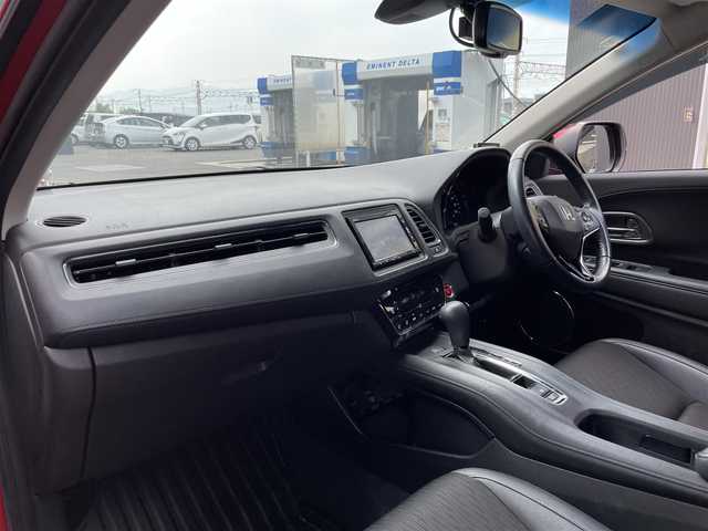 ホンダ ヴェゼル X ホンダセンシング 滋賀県 2018(平30)年 4.9万km プレミアムクリスタルレッドM 純正SDナビ/【フルセグTV、CD・DVD、Bluetooth】/バックカメラ/衝突被害軽減システム/車線逸脱警報/追従式クルーズコントロール/ハーフレザーシート/横滑り防止装置/ビルトインETC/ドライブレコーダー/アイドリングストップ/LEDヘッドライト/オートライト/フォグランプ/純正16インチAW/シートヒーター/電動パーキングブレーキ/プッシュスタート/スマートキー/純正フロアマット/スペアキー