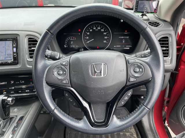ホンダ ヴェゼル X ホンダセンシング 滋賀県 2018(平30)年 4.9万km プレミアムクリスタルレッドM 純正SDナビ/【フルセグTV、CD・DVD、Bluetooth】/バックカメラ/衝突被害軽減システム/車線逸脱警報/追従式クルーズコントロール/ハーフレザーシート/横滑り防止装置/ビルトインETC/ドライブレコーダー/アイドリングストップ/LEDヘッドライト/オートライト/フォグランプ/純正16インチAW/シートヒーター/電動パーキングブレーキ/プッシュスタート/スマートキー/純正フロアマット/スペアキー