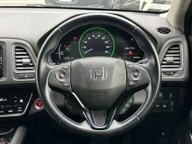 ホンダ ヴェゼル ハイブリッド Z ホンダセンシング 島根県 2018(平30)年 5万km ミッドナイトブルービームM 純正ナビ/ホンダセンシング/CD/DVD/DTV/Bluetooth/バックカメラ/ドライブレコーダー/レーダークルーズコントロール/LEDオートライト/ステアリングスイッチ/ハーフレザーシート/運転席/助手席シートヒーター/ビルトインETC/純正フロアマット/ドアバイザー/スマートキー/スペアキー/プッシュスタート/純正アルミホイール/取扱説明書