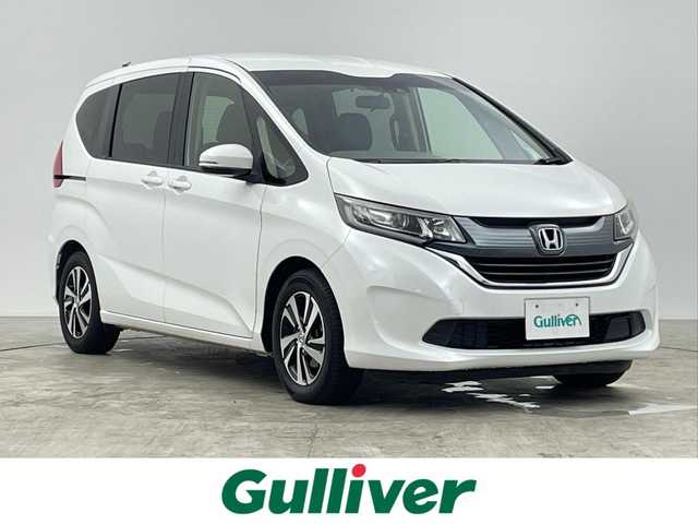 ホンダ フリード G ホンダセンシング 千葉県 2016(平28)年 10万km ホワイトオーキッドパール ホンダセンシング/・衝突軽減ブレーキ/・先行車発進お知らせ/・路外逸脱警報/・レーンキープアシスト/・標識認識/純正9インチSDナビ/CD DVD BT MSV フルセグ/バックカメラ/両側パワースライドドア/アダプティブクルーズコントロール/LEDオートライト/ハーフレザーシート/純正15インチアルミホイール/革巻きステアリング/ステアリングスイッチ/ウォークスルー/純正フロアマット/プッシュスタート/スマートキー