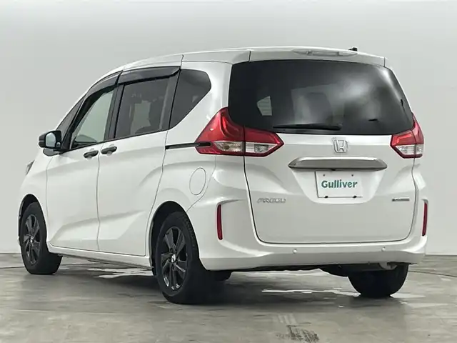 ホンダ フリード ハイブリット G ブラックスタイル 福島県 2023(令5)年 2.3万km プラチナホワイトパール ホンダセンシング/・衝突軽減ブレーキ（CMBS）/・誤発進抑制機能/・後方誤発進抑制機能/・近距離衝突軽減ブレーキ/・歩行者事故低減ステアリング/・路外逸脱抑制機能/・アダプティブクルーズコントロール（ACC）/・車線維持支援システム（LKAS）/・トラフィックジャムアシスト(渋滞運転支援機能）/・先行車発進お知らせ機能/・標識認識機能/・後退出庫サポート/・急アクセル抑制機能/純正ナビ：VXM-224VFi/・フルセグ/BT/CD/DVD/SD/USB/FM/AM/・バックカメラ/・ETC/両側パワースライドドア/ドライブレコーダー/シートヒーター/革巻きステアリング/・ステアリングスイッチ/ＬＥＤヘッドライト/・オートライト/純正フロント/ドアバイザー/電動格納ミラー/スマートキー/・プッシュスタート