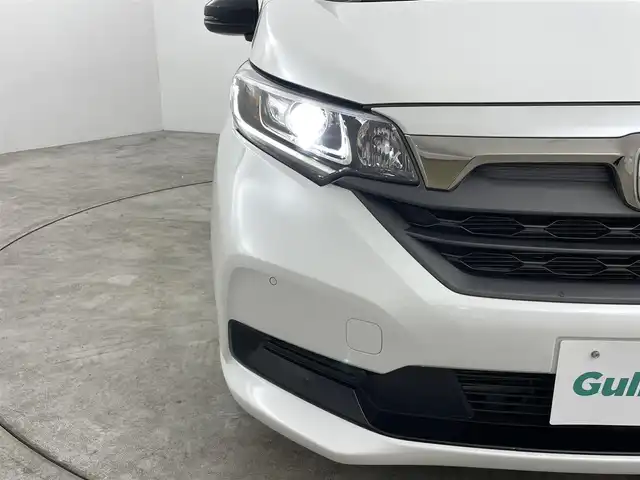ホンダ フリード ハイブリット G ブラックスタイル 福島県 2023(令5)年 2.3万km プラチナホワイトパール ホンダセンシング/・衝突軽減ブレーキ（CMBS）/・誤発進抑制機能/・後方誤発進抑制機能/・近距離衝突軽減ブレーキ/・歩行者事故低減ステアリング/・路外逸脱抑制機能/・アダプティブクルーズコントロール（ACC）/・車線維持支援システム（LKAS）/・トラフィックジャムアシスト(渋滞運転支援機能）/・先行車発進お知らせ機能/・標識認識機能/・後退出庫サポート/・急アクセル抑制機能/純正ナビ：VXM-224VFi/・フルセグ/BT/CD/DVD/SD/USB/FM/AM/・バックカメラ/・ETC/両側パワースライドドア/ドライブレコーダー/シートヒーター/革巻きステアリング/・ステアリングスイッチ/ＬＥＤヘッドライト/・オートライト/純正フロント/ドアバイザー/電動格納ミラー/スマートキー/・プッシュスタート