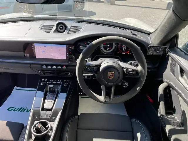 ポルシェ ポルシェ ９１１ カレラ4 GTS 神奈川県 2023(令5)年 0.4万km グレー サンルーフ/スポーツクロノ/スポーツエグゾースト/PASM/純正20/21インチAW/エクステリアパッケージ/電動リヤスポイラー/レッドブレーキキャリパー/LEDヘッドライト/ハーフレザーシート/前席パワーシート/シートヒーター/アルカンターラステアリング/アルカンターラトリム/センターコンソールPORSCHE刺繍/BOSEスピーカー/レーダークルーズコントロール/PCS/BSM/コーナーセンサー/純正メモリーナビ/純正USB/BT再生/Apple Car Play、Android Auto、Spotify/全方位カメラ/ETC2.0/前後ドライブレコーダー/スマートキー×2/パドルシフト/電格ミラー/アイドリングストップ/R6/7年ディーラー整備記録/保証書・取説あり