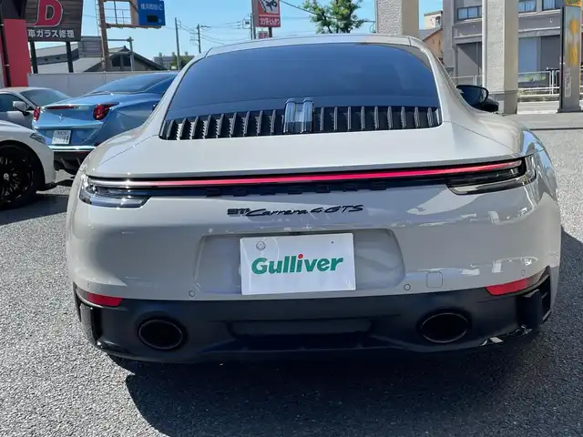 ポルシェ ポルシェ ９１１ カレラ4 GTS 神奈川県 2023(令5)年 0.4万km グレー サンルーフ/スポーツクロノ/スポーツエグゾースト/PASM/純正20/21インチAW/エクステリアパッケージ/電動リヤスポイラー/レッドブレーキキャリパー/LEDヘッドライト/ハーフレザーシート/前席パワーシート/シートヒーター/アルカンターラステアリング/アルカンターラトリム/センターコンソールPORSCHE刺繍/BOSEスピーカー/レーダークルーズコントロール/PCS/BSM/コーナーセンサー/純正メモリーナビ/純正USB/BT再生/Apple Car Play、Android Auto、Spotify/全方位カメラ/ETC2.0/前後ドライブレコーダー/スマートキー×2/パドルシフト/電格ミラー/アイドリングストップ/R6/7年ディーラー整備記録/保証書・取説あり
