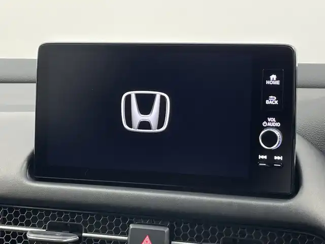 ホンダ ＺＲ－Ｖ ハイブリッド e:HEV Z 新潟県 2024(令6)年 1.3万km クリスタルブラックパール 純正メモリナビ/　フルセグTV/Bluetooth/USB/ホンダセンシング/・衝突被害軽減ブレーキ/・先行車発進お知らせ機能/・歩行者事故低減ステアリング/・路外逸脱抑制機能/・標識認識機能/・渋滞追従機能付アダプティブクルーズコントロール/・車線維持支援システム/・トラフィックジャムアシスト(渋滞運転支援機能)/・ブラインドスポットインフォメーション/・誤発進抑制機能/・後方誤発進抑制機能/・近距離衝突軽減ブレーキ/・パーキングセンサーシステム/・後退出庫サポート/・オートハイビーム/・アダプティブドライビングビーム/MUGENエアロ/BOSEプレミアムサウンドシステム/パワーバックドア/レザーシート/前席シートヒーター/前席パワーシート/D席メモリーシート/全方位モニター/ビルトインETC2.0/前後コーナーセンサー/ヒルディセントコントロール/ステアリングヒーター/オートマチックハイビーム/LEDヘッドライト/オートライト/横滑り防止装置/パドルシフト/レザーステアリング/置くだけ充電