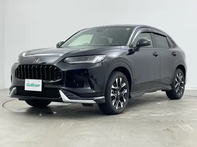 ホンダ ＺＲ－Ｖ ハイブリッド e:HEV Z 新潟県 2024(令6)年 1.3万km クリスタルブラックパール 純正メモリナビ/　フルセグTV/Bluetooth/USB/ホンダセンシング/・衝突被害軽減ブレーキ/・先行車発進お知らせ機能/・歩行者事故低減ステアリング/・路外逸脱抑制機能/・標識認識機能/・渋滞追従機能付アダプティブクルーズコントロール/・車線維持支援システム/・トラフィックジャムアシスト(渋滞運転支援機能)/・ブラインドスポットインフォメーション/・誤発進抑制機能/・後方誤発進抑制機能/・近距離衝突軽減ブレーキ/・パーキングセンサーシステム/・後退出庫サポート/・オートハイビーム/・アダプティブドライビングビーム/MUGENエアロ/BOSEプレミアムサウンドシステム/パワーバックドア/レザーシート/前席シートヒーター/前席パワーシート/D席メモリーシート/全方位モニター/ビルトインETC2.0/前後コーナーセンサー/ヒルディセントコントロール/ステアリングヒーター/オートマチックハイビーム/LEDヘッドライト/オートライト/横滑り防止装置/パドルシフト/レザーステアリング/置くだけ充電