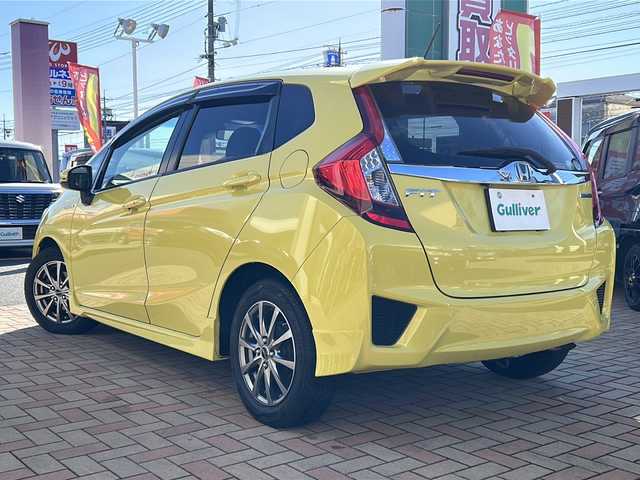 ホンダ フィット ハイブリット Sパッケージ 鳥取県 2013(平25)年 16.9万km アトラクトイエローパール ワンオーナー/スマートキー/パドルシフト/純正フルエアロ/シティブレーキサポート/レーンデパーチャーアラート/メーカーインターナビ/フルセグ・Bluetooth/バックカメラ/HDMI/USB入力/社外スピーカー/モデューロ製AWラジアル４本積込/LEDヘッドライト/フォグライト/ビルトインETC/保証書・取説