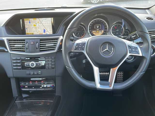 メルセデス・ベンツ Ｅ２５０ ブルーエフィシェンシー AVG 山口県 2013(平25)年 1.6万km カルサイトホワイト ワンオーナー車/登録時走行距離15155km/純正HDDナビ/バックカメラ/CD/DVD再生/フルセグTV/キセノンライト/オートライト/リアフォグライト/ステアリングスイッチ/クルーズコントロール/電動チルト＆テレスコピック機能/ハーフレザーシート/コーナーセンサー/純正18インチAW（前後異形サイズ）/保証書・取説/スペアキー1個/屋根付き車庫保管/（前オーナー様ご申告情報によるもので保証するものではございません）