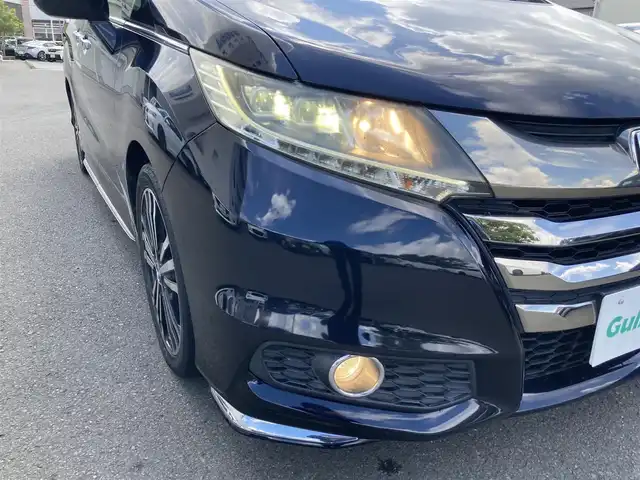ホンダ オデッセイ アブソルート EX 静岡県 2015(平27)年 8.8万km プレミアムヴィーナスブラックP Honda SENSING/純正ナビ（VXM-152VFi）/   AM FM CD DVD Bluetooth SD　/フルセグTV/バックカメラ/ETC/アダプティブクルーズコントロール/ブラインドスポットモニタリング/運転席パワーシート/2列目プレミアムクレードルシート/オットマン/LEDヘッドライト/LEDルームランプ/パドルシフト/フロントフォグランプ/コンフォートビューパッケージ/純正18インチアルミホイール/スマートキー