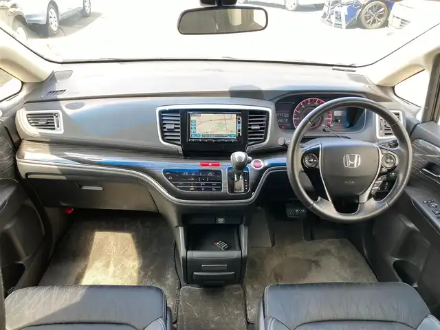 ホンダ オデッセイ アブソルート EX 静岡県 2015(平27)年 8.8万km プレミアムヴィーナスブラックP Honda SENSING/純正ナビ（VXM-152VFi）/   AM FM CD DVD Bluetooth SD　/フルセグTV/バックカメラ/ETC/アダプティブクルーズコントロール/ブラインドスポットモニタリング/運転席パワーシート/2列目プレミアムクレードルシート/オットマン/LEDヘッドライト/LEDルームランプ/パドルシフト/フロントフォグランプ/コンフォートビューパッケージ/純正18インチアルミホイール/スマートキー