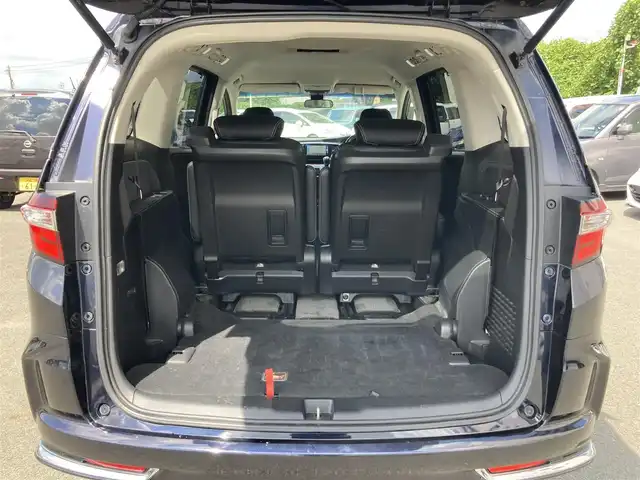 ホンダ オデッセイ アブソルート EX 静岡県 2015(平27)年 8.8万km プレミアムヴィーナスブラックP Honda SENSING/純正ナビ（VXM-152VFi）/   AM FM CD DVD Bluetooth SD　/フルセグTV/バックカメラ/ETC/アダプティブクルーズコントロール/ブラインドスポットモニタリング/運転席パワーシート/2列目プレミアムクレードルシート/オットマン/LEDヘッドライト/LEDルームランプ/パドルシフト/フロントフォグランプ/コンフォートビューパッケージ/純正18インチアルミホイール/スマートキー
