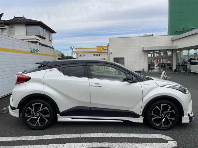 トヨタ Ｃ－ＨＲ ハイブリッド 1．8G 愛媛県 2019(令1)年 5.3万km ブラック/ホワイトパールクリスタルシャイン 2トーン 純正メモリナビ（ＤＴＶ.BT.DISC.ラジオ）/モデリスタフルエアロ/レーダークルーズコントロール/純正アルミ/シートカバー/ＢＳＭ/オートライト/オートハイビーム/ＨＤＭＩ/ブレーキホールド/スペアキーあり