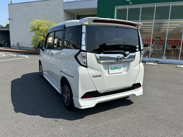 トヨタ タンク カスタムG 岡山県 2019(令1)年 6万km パールホワイトⅢ TRDエアロ/純正7型ナビ/(CD/DVD/BT/フルセグTV)/純正フリップダウンモニター/バックカメラ/衝突被害軽減システム/クルーズコントロール/両側パワースライドドア/横滑り防止装置/ETC/LEDヘッドライト/フォグランプ/オートライト/ウィンカーミラー/電動格納ミラー/純正アルミホイール/前席シートヒーター/ステアリングリモコン/コーナーセンサー前後/プッシュスタート/スマートキー/フロアマット/ドアバイザー
