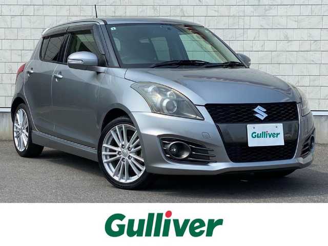 スズキ スイフト スポーツ 岐阜県 2013(平25)年 6.5万km プレミアムシルバーメタリック clarion製ナビ/（フルセグTV/CD/DVD/ipod）/バックカメラ/クルーズコントロール/キセノンヘッドライト/フロントフォグ/オートライト/革巻きステアリング/MTモード付AT/パドルシフト/アルミペダル/純正17インチAW/純正フロアマット/純正ドアバイザー/純正ビルトインETC/スマートキー×2/ABS/横滑り防止装置/盗難防止装置/ダブル＋サイドエアバッグ