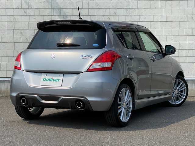 スズキ スイフト スポーツ 岐阜県 2013(平25)年 6.5万km プレミアムシルバーメタリック clarion製ナビ/（フルセグTV/CD/DVD/ipod）/バックカメラ/クルーズコントロール/キセノンヘッドライト/フロントフォグ/オートライト/革巻きステアリング/MTモード付AT/パドルシフト/アルミペダル/純正17インチAW/純正フロアマット/純正ドアバイザー/純正ビルトインETC/スマートキー×2/ABS/横滑り防止装置/盗難防止装置/ダブル＋サイドエアバッグ