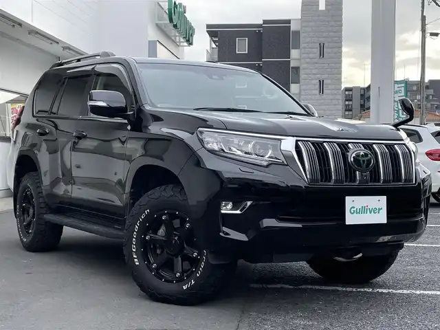 トヨタ ランドクルーザー プラド TX Lパッケージ 千葉県 2018(平30)年 5.2万km ブラック ４WD/・センターデフロック/・ダウンヒルアシストコントロール/社外メモリー9インチナビ/・CD/DVD/・AM/FM/・バッグ/サイドカメラ/・フルセグTV/・BT/コーナーセンサー/クルーズコントロール/衝突軽減システム/レーンキープアシスト/ハーフレザー/・パワーシート/・エアシート/・純正フロアマット/MKW17インチAW/ガナドールマフラー/LEDヘッドライト/・オートライト/・オートマチックハイビーム/W＋サイドエアバッグ/・カーテンエアバッグ/ETC/スマートキー/・スペアキー/保証書・取説