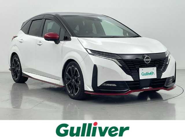 日産 オーラ ニスモ 熊本県 2022(令4)年 5.8万km ピュアホワイトパール / スーパーブラック 2トーン ニスモフルエアロ/純正9インチナビXJ4A（フルセグ・ＢＴ・ApplCarPlay・ＨＤＭＩ・ＵＳＢ）/全周囲カメラ　/純正前方ドライブレコーダー（DH5ーS）　/ビルトインＥＴＣ２．０　/レーダークルーズコントロール/プロパイロット　/ブラインドスポットモニター　/インテリジェントエマージェンシーブレーキ/ダウンヒルアシスト/置くだけ充電/前後クリアランスソナー/純正フロアマット/純正17インチAW/オートライト/オートマチックハイビーム/LEDヘッドライト/フォグランプ/スマートキー/プッシュスタート