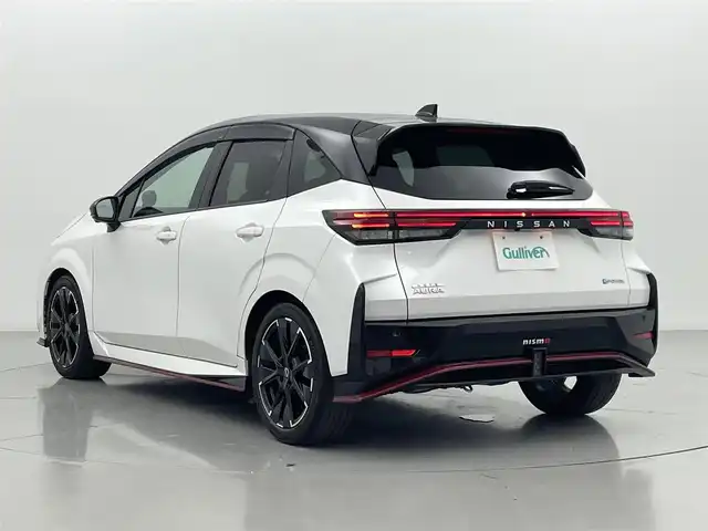 日産 オーラ ニスモ 熊本県 2022(令4)年 5.8万km ピュアホワイトパール / スーパーブラック 2トーン ニスモフルエアロ/純正9インチナビXJ4A（フルセグ・ＢＴ・ApplCarPlay・ＨＤＭＩ・ＵＳＢ）/全周囲カメラ　/純正前方ドライブレコーダー（DH5ーS）　/ビルトインＥＴＣ２．０　/レーダークルーズコントロール/プロパイロット　/ブラインドスポットモニター　/インテリジェントエマージェンシーブレーキ/ダウンヒルアシスト/置くだけ充電/前後クリアランスソナー/純正フロアマット/純正17インチAW/オートライト/オートマチックハイビーム/LEDヘッドライト/フォグランプ/スマートキー/プッシュスタート