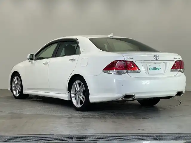 トヨタ クラウン アスリート アニバーサリーエディション 栃木県 2012(平24)年 6万km ホワイトパールクリスタルシャイン 特別仕様車/純正ナビ/(フルセグTV・CD・DVD・USB)/バックカメラ/前後ドライブレコーダー/クルーズコントロール/前後コーナーセンサー/合皮シート/前席パワーシート/シートメモリ/前席シートヒーター/前席シートクーラー/HIDヘッドライト/オートライト/フロントフォグランプ/純正アルミホイール/純正フロアマット/MTモード付AT/電動格納ミラー/ステアリングスイッチ/スマートキー